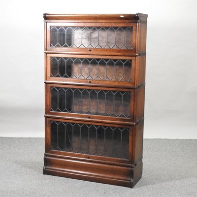 Lot 518 - An early 20th century oak Globe Wernicke style bookcase