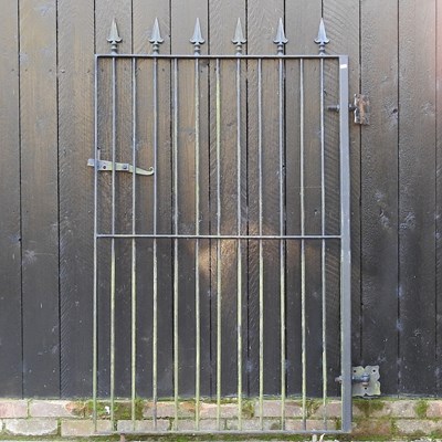 Lot 325 - A hand forged iron garden gate