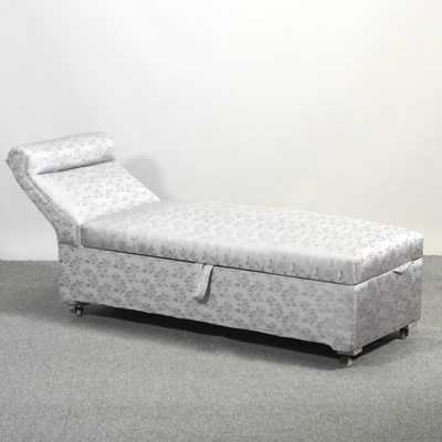 Lot 525 - A grey upholstered day bed