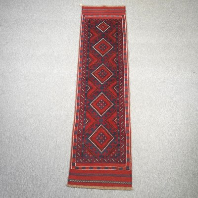 Lot 206 - A kelim runner