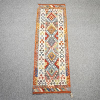 Lot 154 - A kelim runner