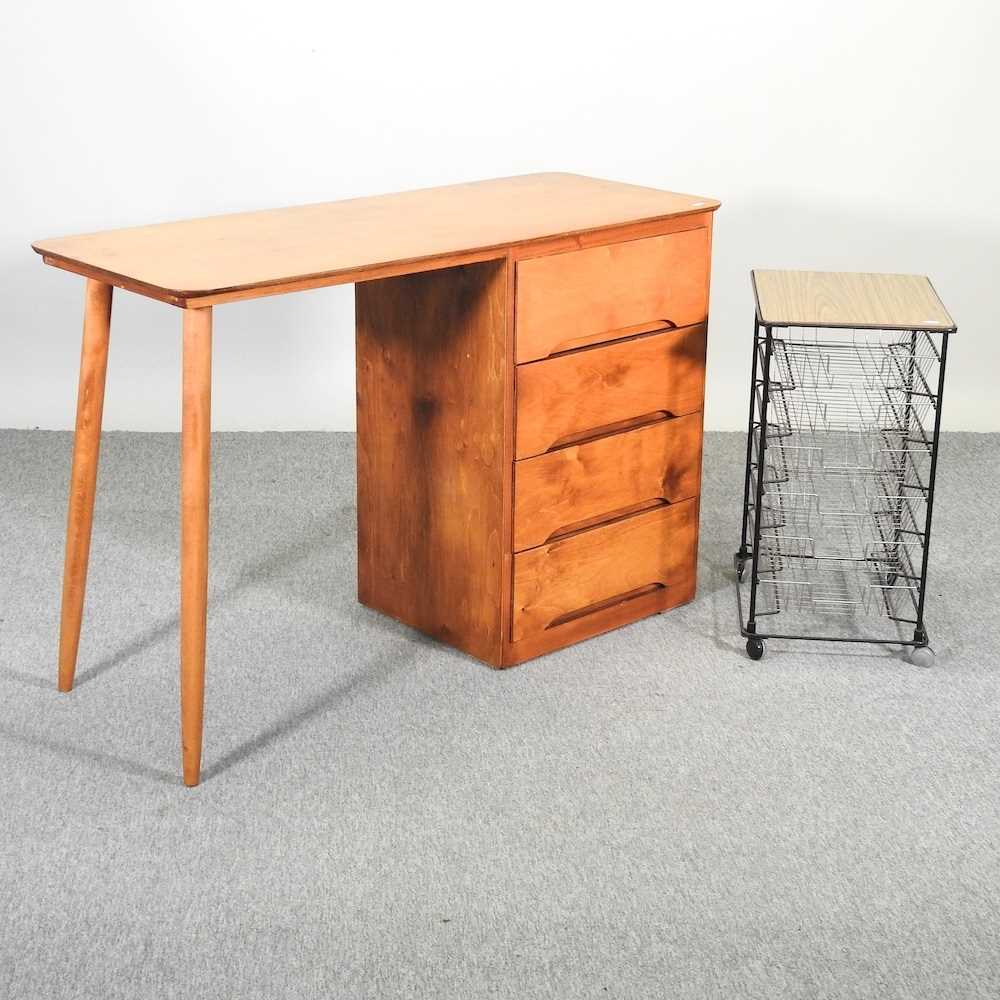 Lot 682 - A mid 20th century desk