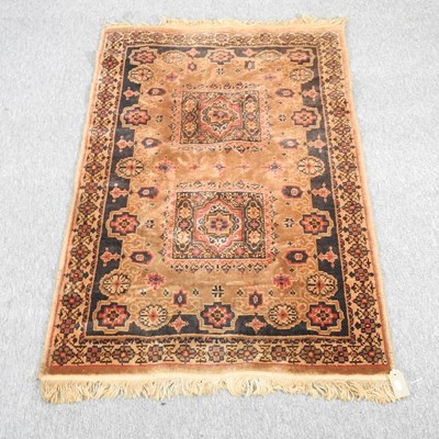 Lot 204 - A woollen prayer rug