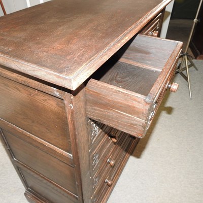 Lot 554 - A dark oak chest