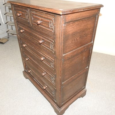 Lot 554 - A dark oak chest