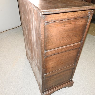 Lot 554 - A dark oak chest