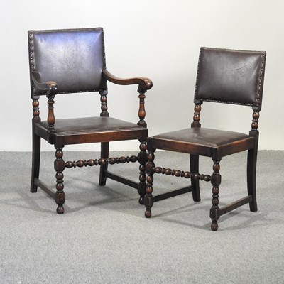 Lot 465 - A set of six oak dining chairs