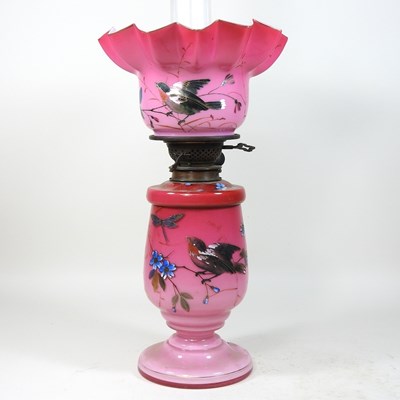 Lot 86 - An 19th century French opaline glass oil lamp