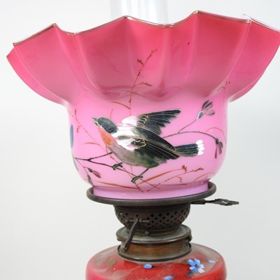 Lot 86 - An 19th century French opaline glass oil lamp