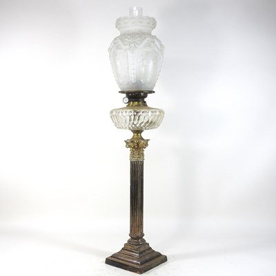 Lot 208 - An 19th century silver plated oil lamp