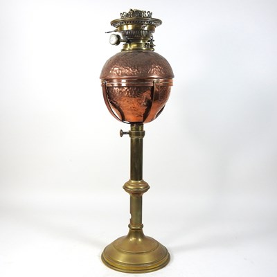 Lot 213 - An American Arts and Crafts adjustable oil lamp