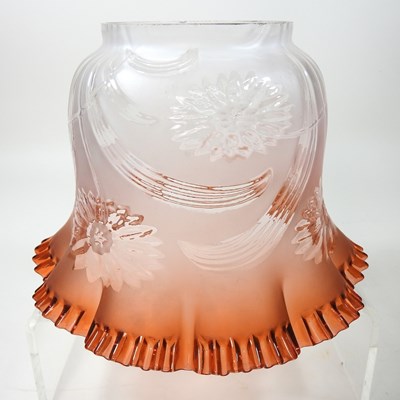 Lot 66 - An amber glass frilled glass oil lamp shade