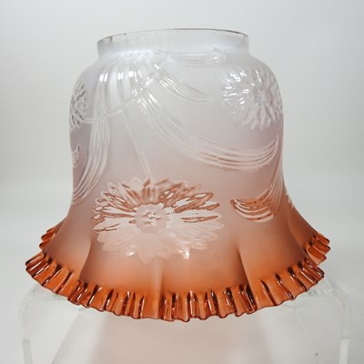 Lot 66 - An amber glass frilled glass oil lamp shade