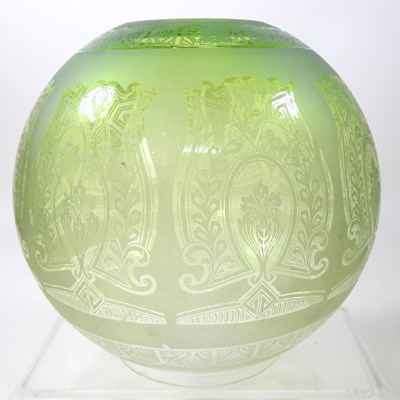 Lot 70 - A green glass oil lamp shade