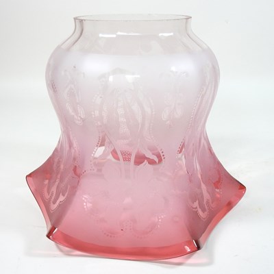 Lot 10 - A red etched glass oil lamp shade