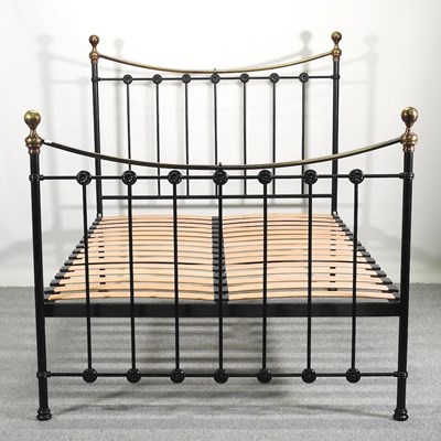 Lot 615 - A Victorian style brass bedstead