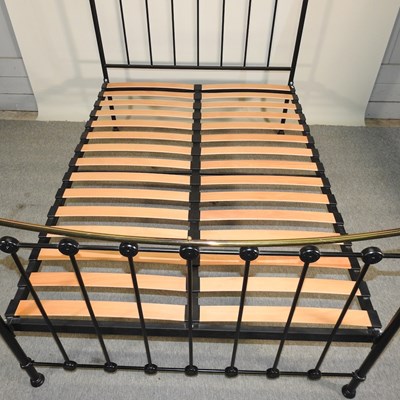 Lot 615 - A Victorian style brass bedstead