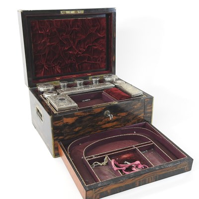 Lot 60 - A Victorian coromandel and brass bound dressing case
