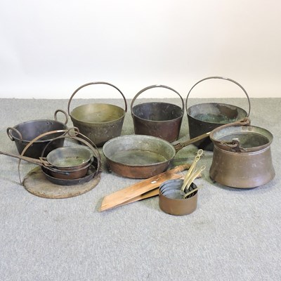 Lot 376 - A collection of antique saucepans