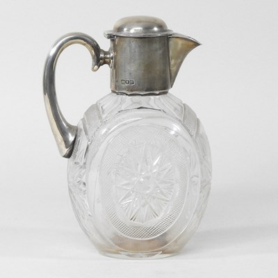 Lot 92 - A Victorian silver mounted cut glass claret jug