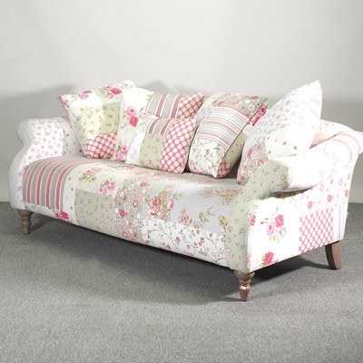 Lot 590 - A modern floral upholstered sofa