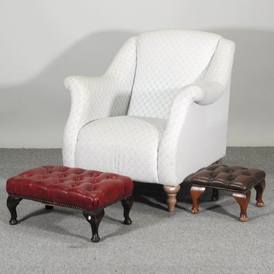 Lot 660 - A modern upholstered armchair