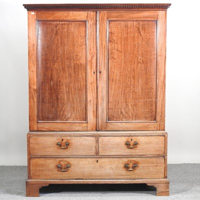 Lot 550 - A George III mahogany linen press