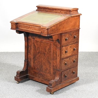 Lot 671 - A Victorian burr walnut davenport