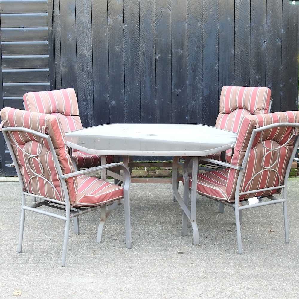 Lot 321 - A metal garden table and chairs