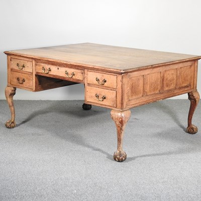 Lot 427 - A Waring & Gillow oak partner's desk