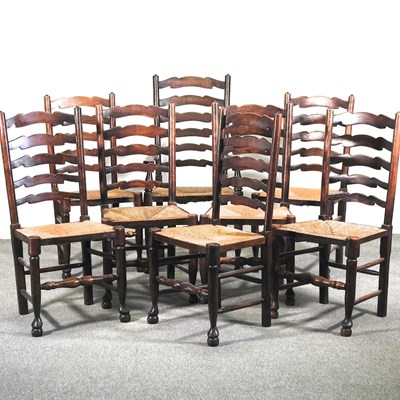 Lot 462 - A set of eight ladderback dining chairs