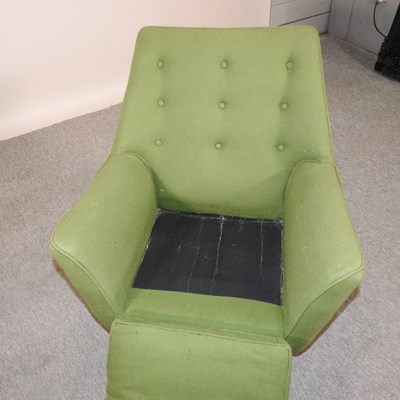 Lot 623 - A 1960's green upholstered armchair