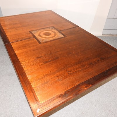 Lot 630 - A contemporary inlaid hardwood dining table