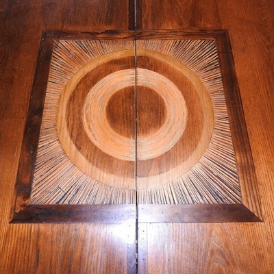 Lot 630 - A contemporary inlaid hardwood dining table