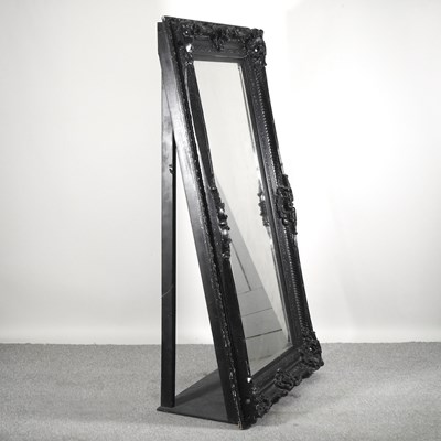 Lot 564 - A modern black painted cheval mirror