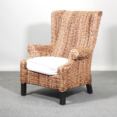 Lot 393 - A modern wicker armchair