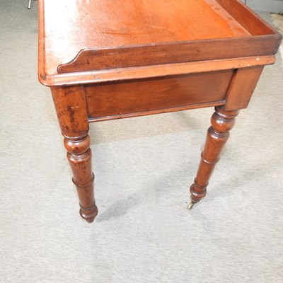 Lot 515 - A Victorian mahogany side table
