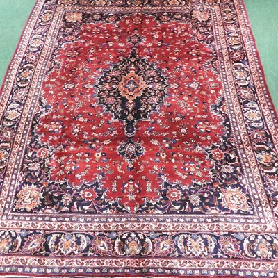 Lot 591 - A Persian woollen carpet