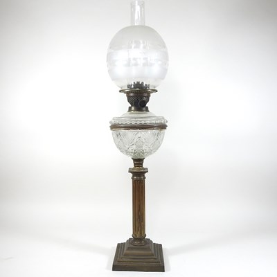 Lot 121 - A 19th century brass oil lamp and shade