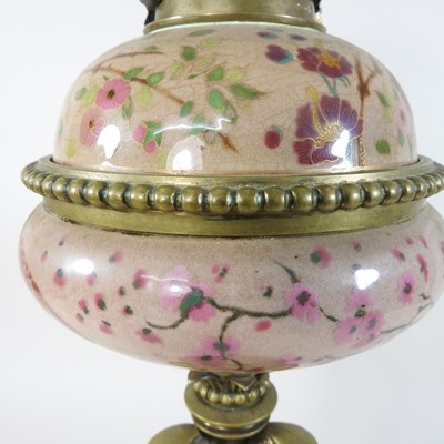 Lot 31 - A red glass oil lamp shade