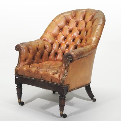 Lot 43 - A George IV leather button back library armchair