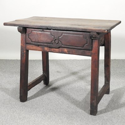 Lot 566 - An antique elm side table