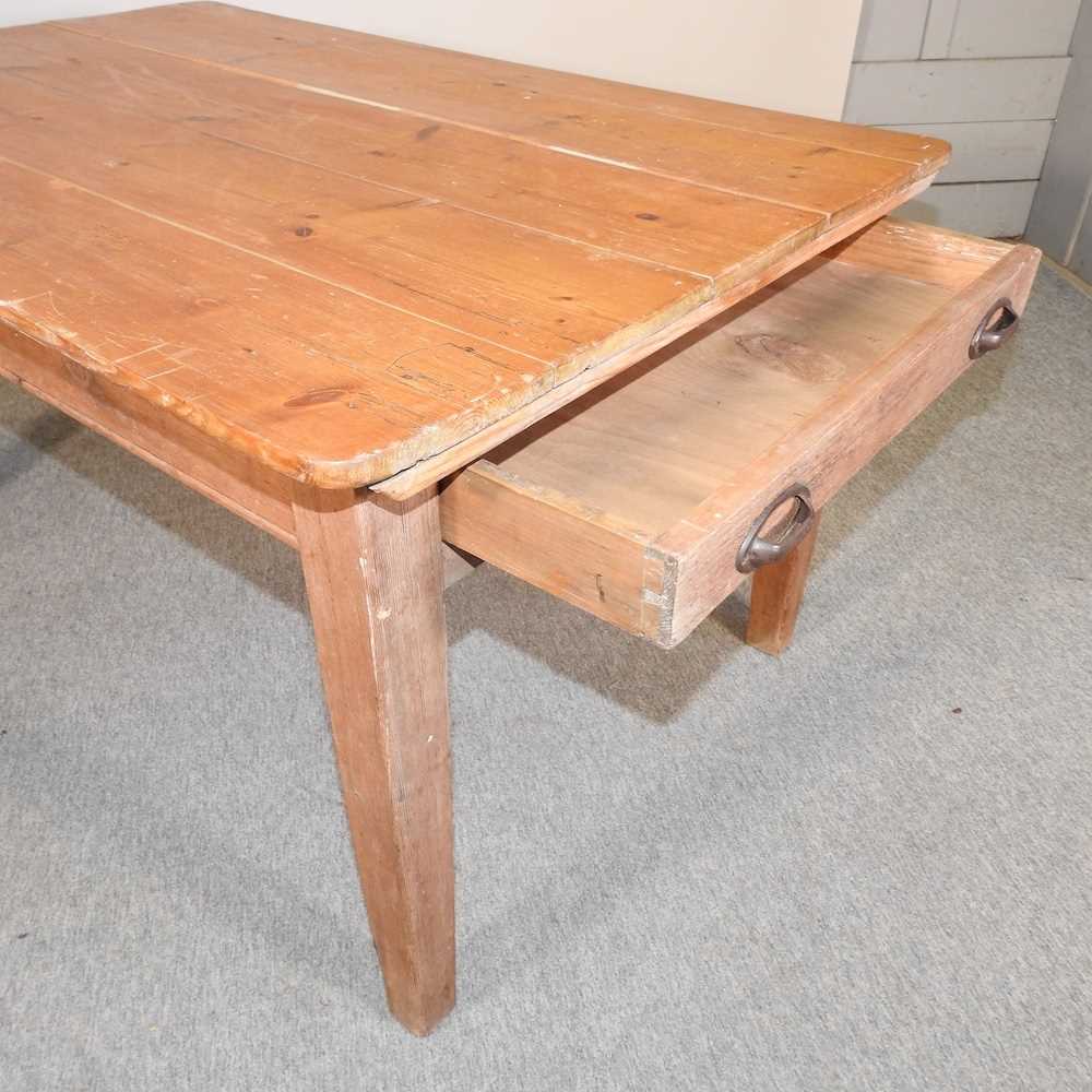 Lot 366 An antique pine kitchen table