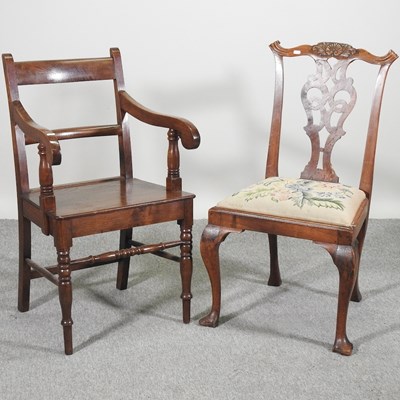 Lot 584 - A 19th century oak carver chair