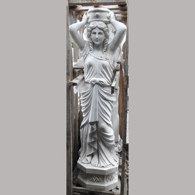 Lot 666 - Two life size marble columns