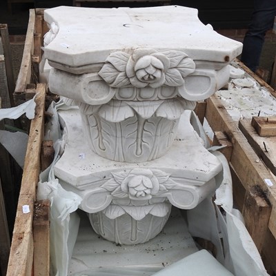 Lot 672 - A pair of carved marble capitals