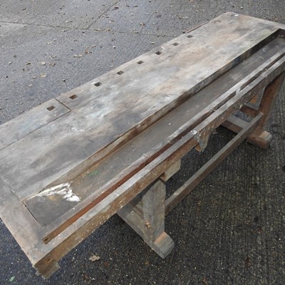 Lot 338 - A wooden work bench