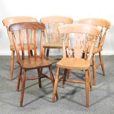 Lot 403 - A set of four beech dining chairs