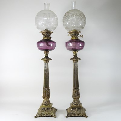 Lot 21 - A pair of Victorian style brass oil lamps and shades
