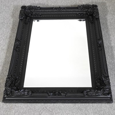 Lot 389 - A black framed wall mirror